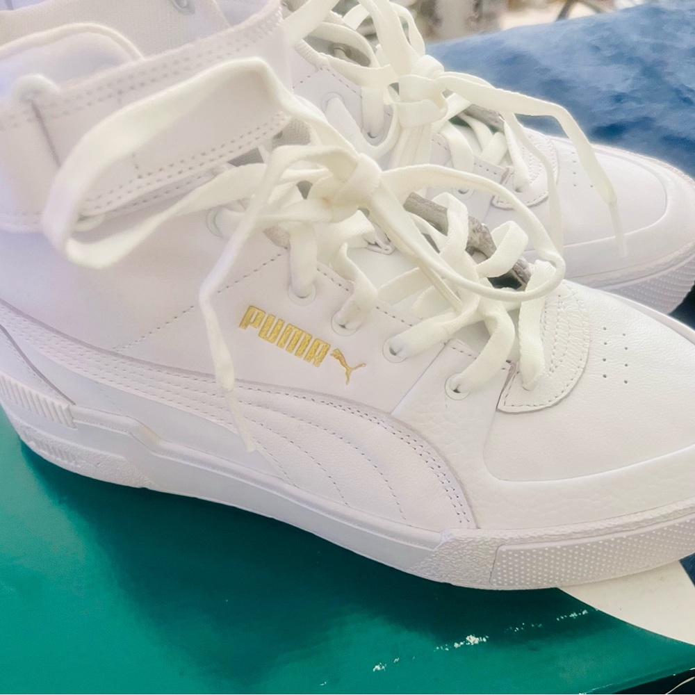 Puma Women’s 10.5 white.